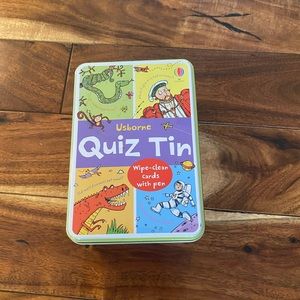 Usborne books quiz tin lightly used.